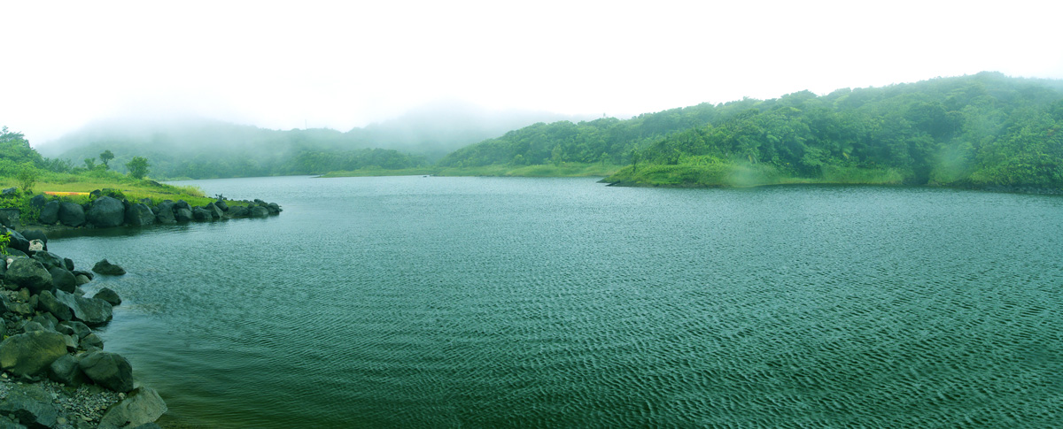 Small Boeri Lake cupped in elfin woodland and cloud forest, boeri lake dominica’s quiet highland tarn on the Morne Trois Pitons plateau trail.