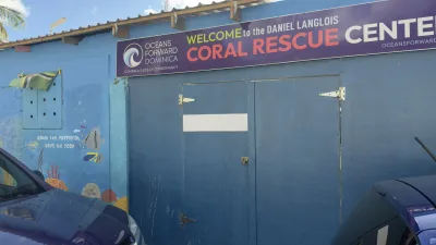Coral rescue tanks and interpretive displays near the coast, soufriere dominica community efforts on reef restoration beside the bay, Dominica.