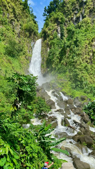 Father Falls thundering on the left and Mother Falls on the right from the platform, father falls close-up beside twin falls dominica classic framing, Dominica.
