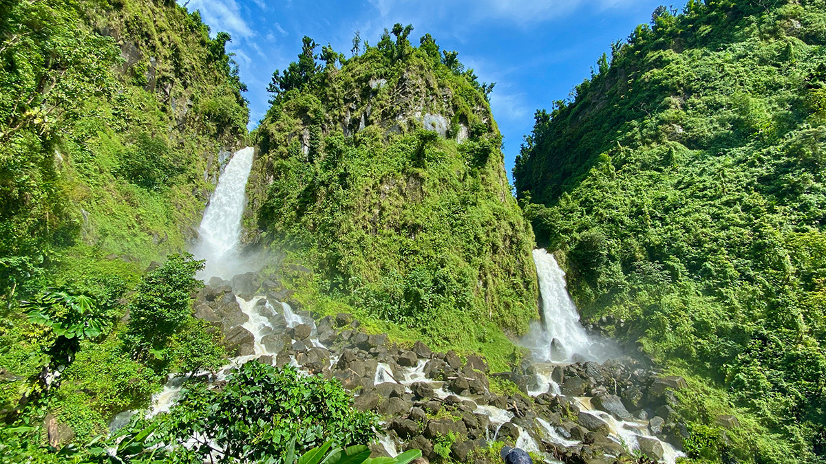 Twin Trafalgar cascades with Father left and Mother right from the platform, trafalgar falls dominica’s top twin falls view in rainforest, Dominica.
